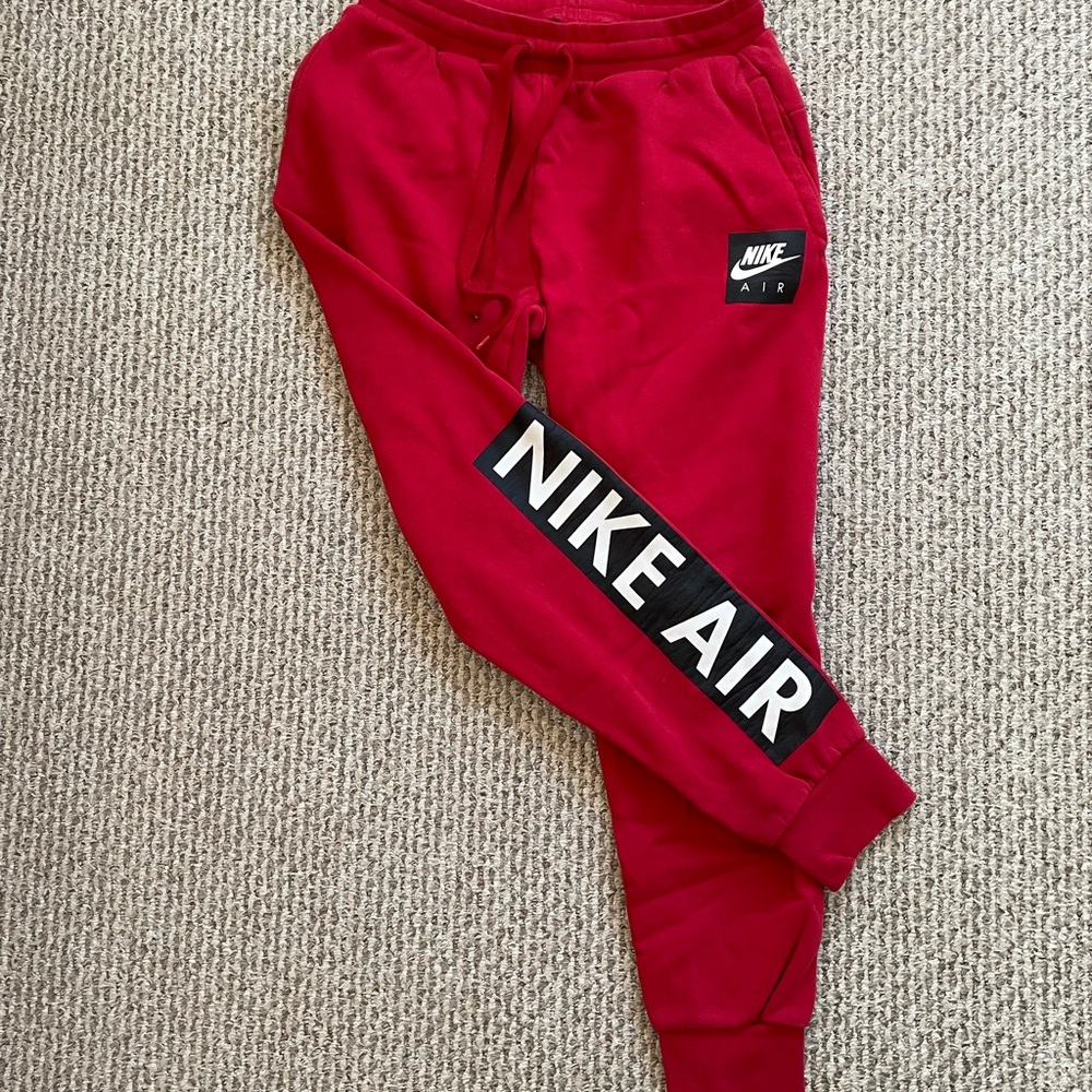 Nike Red Joggers with Tapered Ankle Design